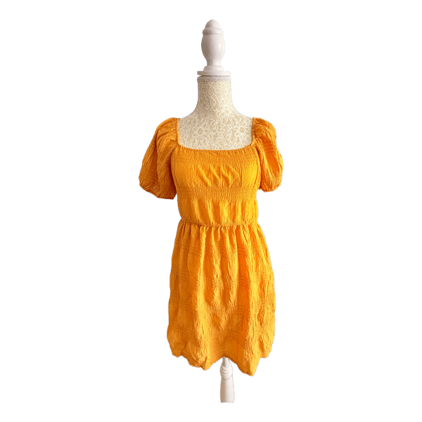 Yellow smocked mini dress