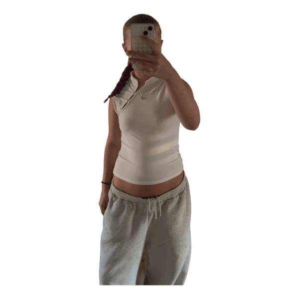 White sleeveless top