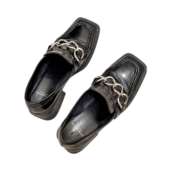 Black heeled loafers with chain detail