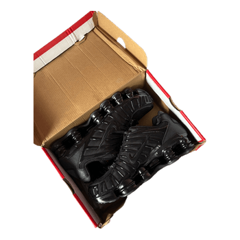 Black Nike Shox sneakers