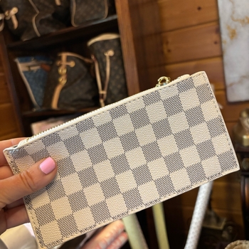 beige valkokuviollinen lompakko
