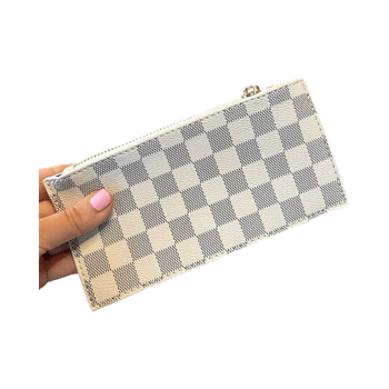beige valkokuviollinen lompakko