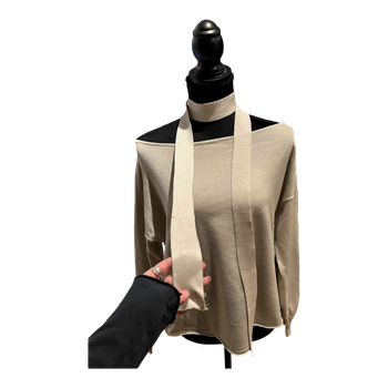 Beige off-shoulder sweater with a scarf