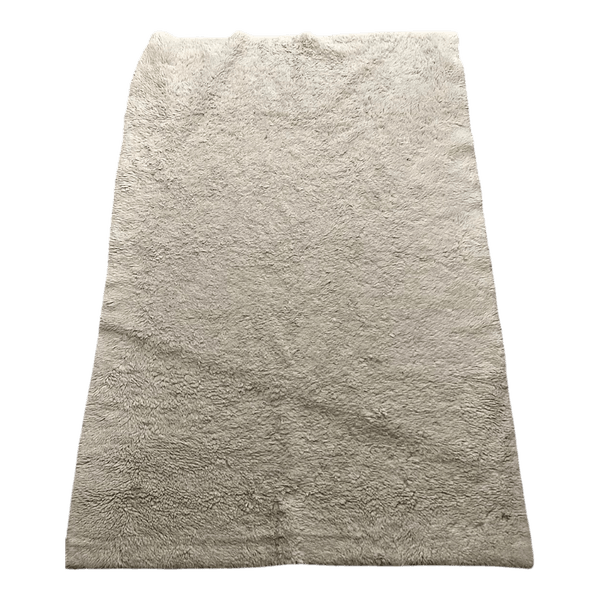 Cream fuzzy rug