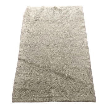 Cream fuzzy rug