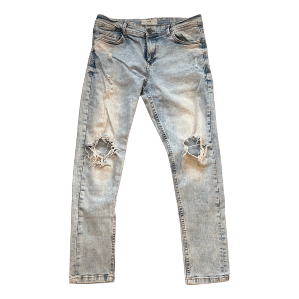 Light blue ripped jeans