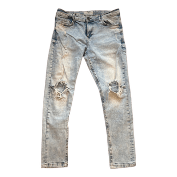 Light blue ripped jeans