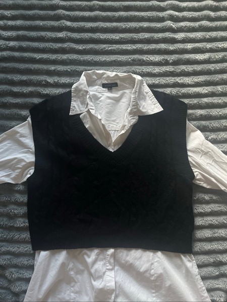 Black cable knit vest