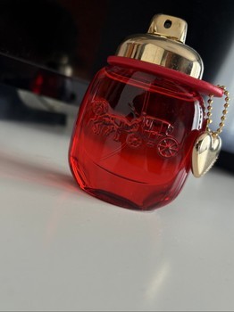 Coach red perfume bottle