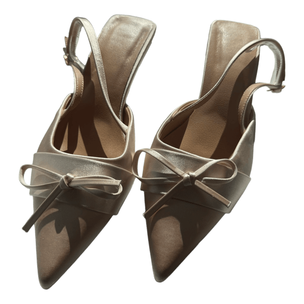 Beige slinky heels with bows