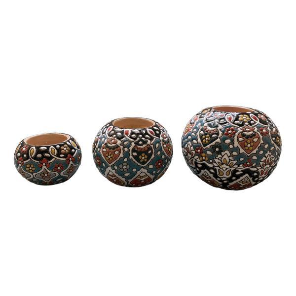 Three patterned ceramic candle holder