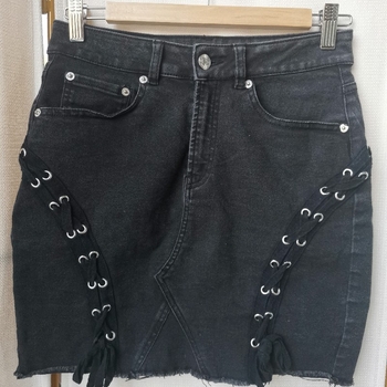 Black denim mini skirt
