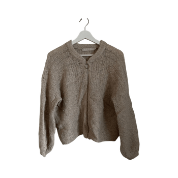 Beige neule