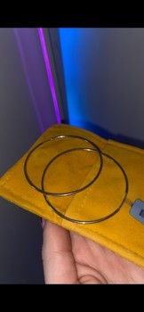 Silver hoop earringa given