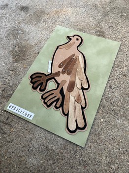 Brown leather bird applique