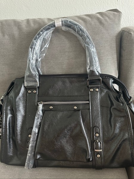Black faux leather handbag