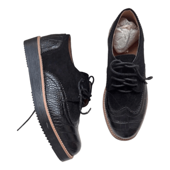 Black platform brogues