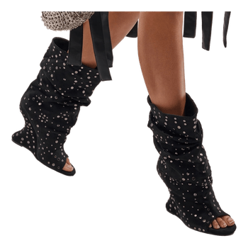 Black studded wedge boots