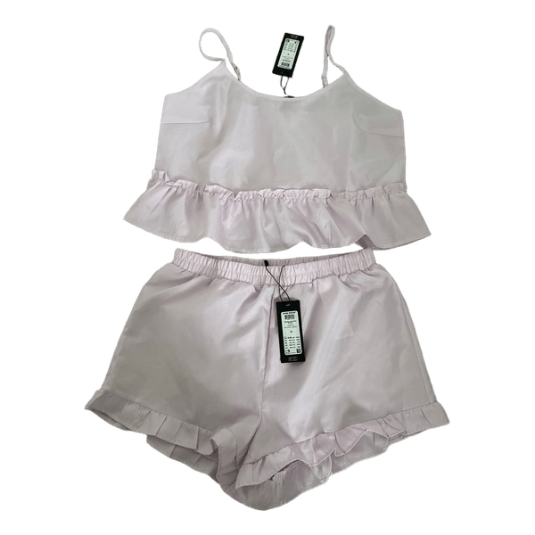 Lilla sæt med top og shorts