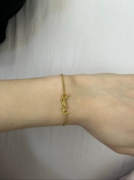 Saint Laurent kultainen rannekoru