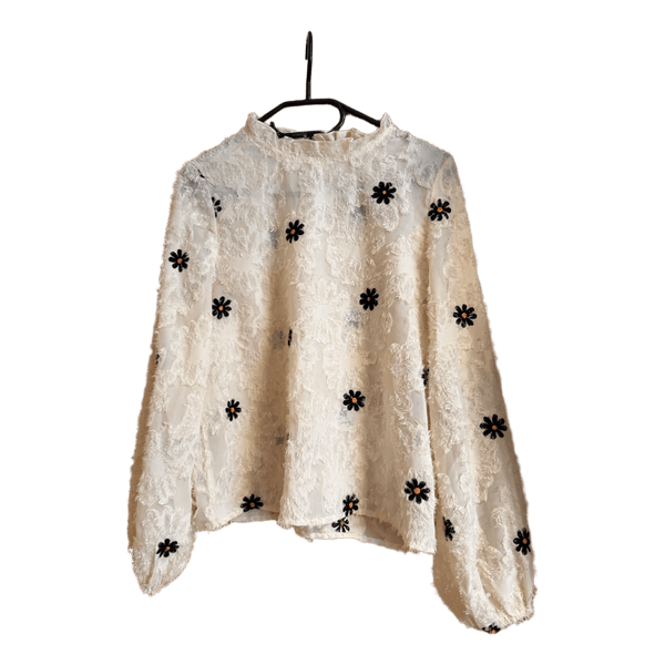 White floral textured blouse