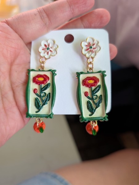 Floral framed drop earrings