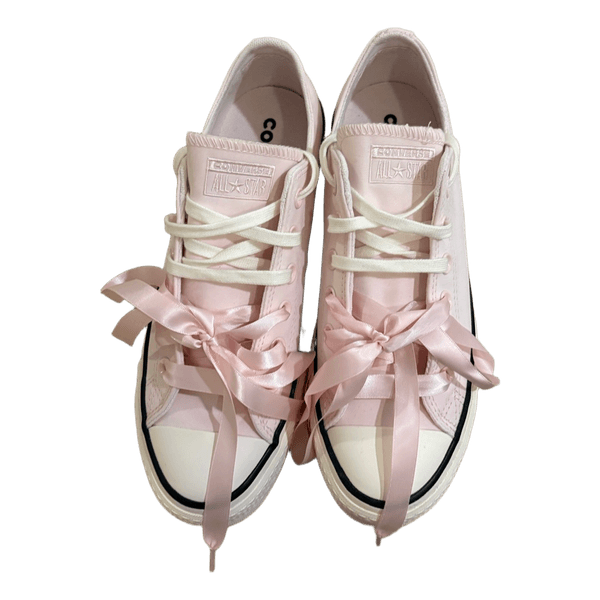 Vaaleanpunaiset Converse-tennarit
