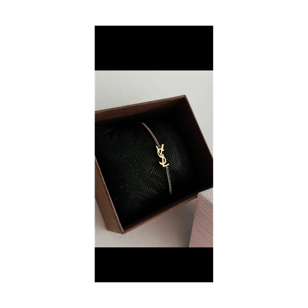 Gold tone logo bracelet