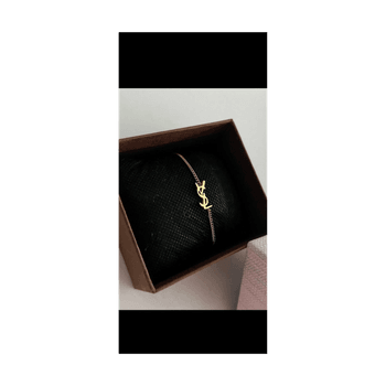 Gold tone logo bracelet