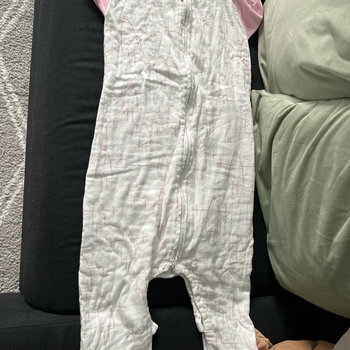 White and pink baby sleepsuit