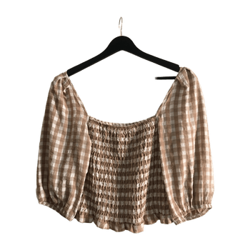 Beige valkokuviollinen pusero