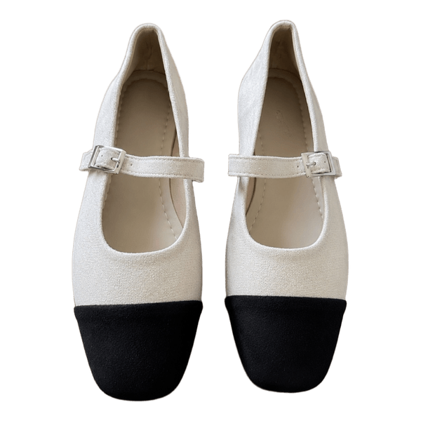 Beige and black mary janes