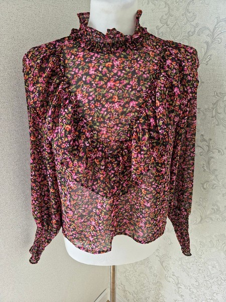 Divided floral long sleeve top