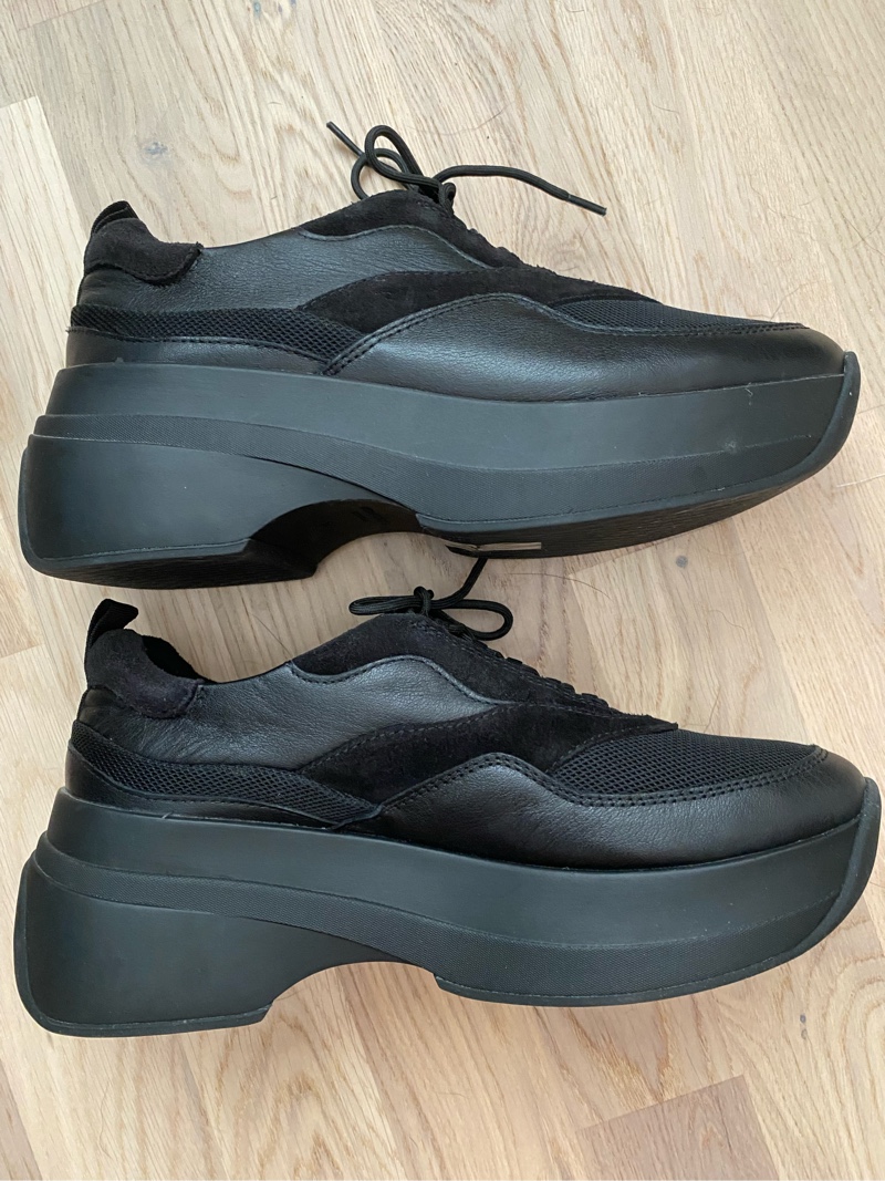 Black platform sneakers