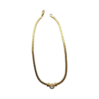 Kultainen kaulakoru zirkonilla