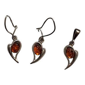 Sudraba auskari un kulons