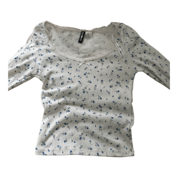 White floral long-sleeved top