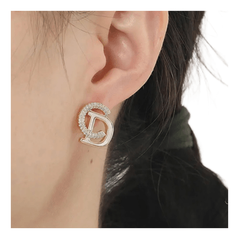 Gold letter D earrings