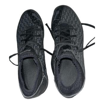 Mustat Puma-treenikengät
