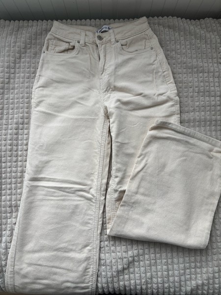 Cream corduroy trousers