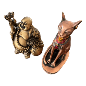 Buddha and Bastet statues