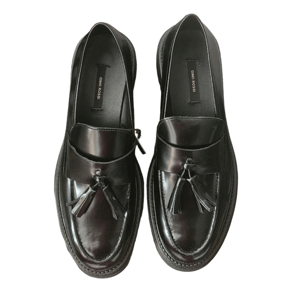 Black leather tassel loafers
