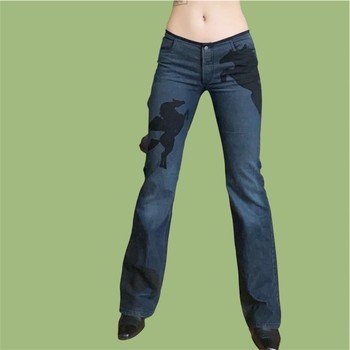 Vintage low waisted dark blue flared jeans with a print