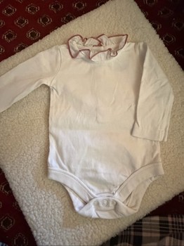 White baby bodysuit