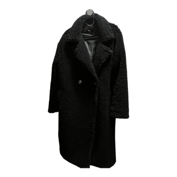 Black teddy coat with double button closure.