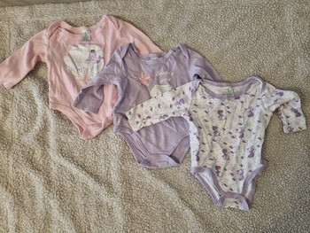 Three baby bodysuits