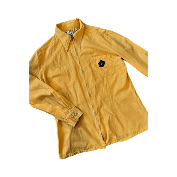 Keltainen kauluspaita, kukkaembleemi