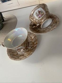 Porcelain cups and saucers