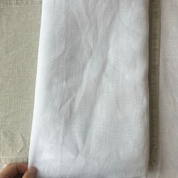White sheer curtain panel