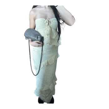 Keltainen röyhelömekko